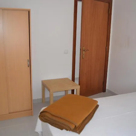 Low Cost Casa de hóspedes *